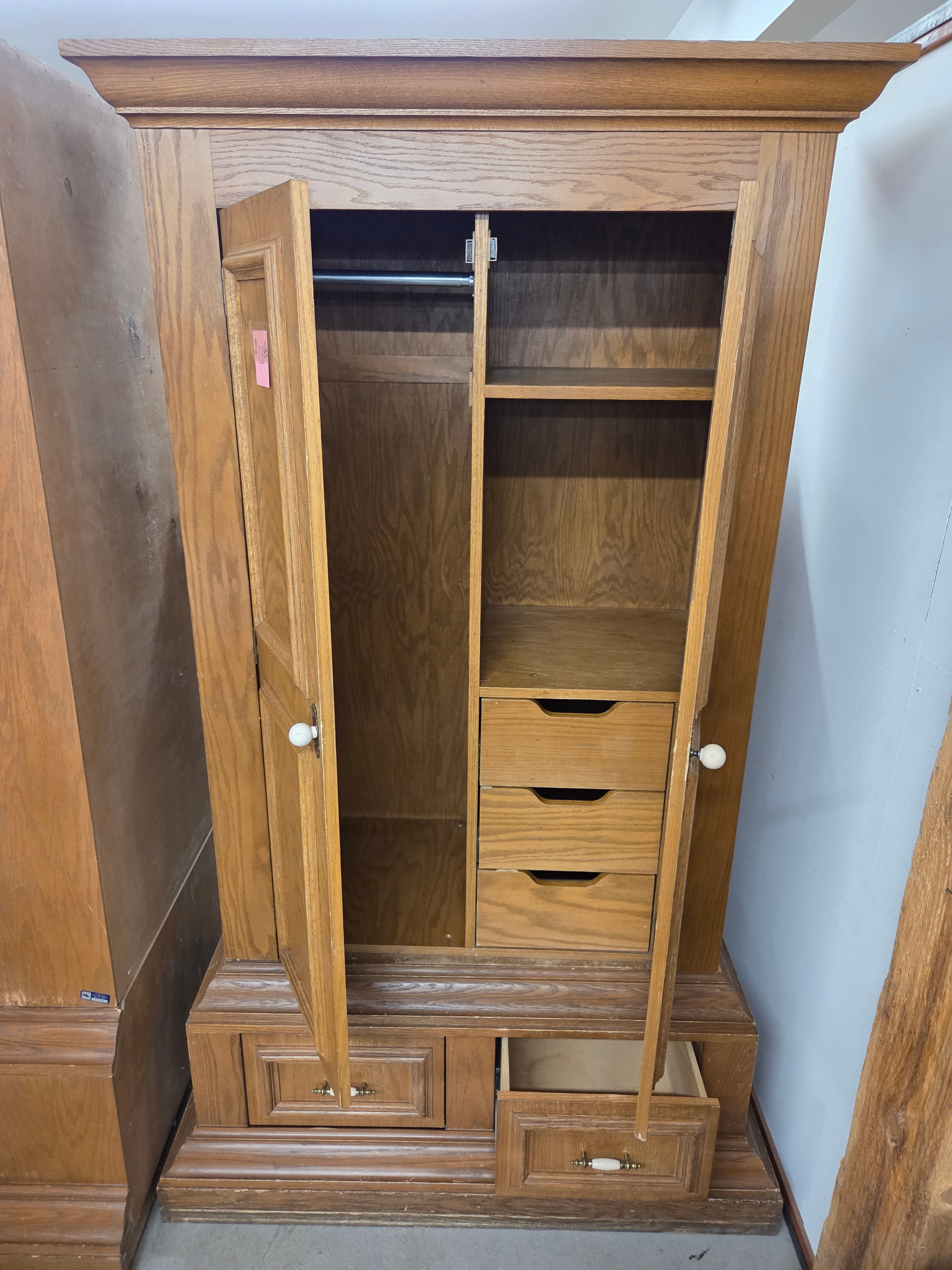Wooden cabinetry and shelving in the basement