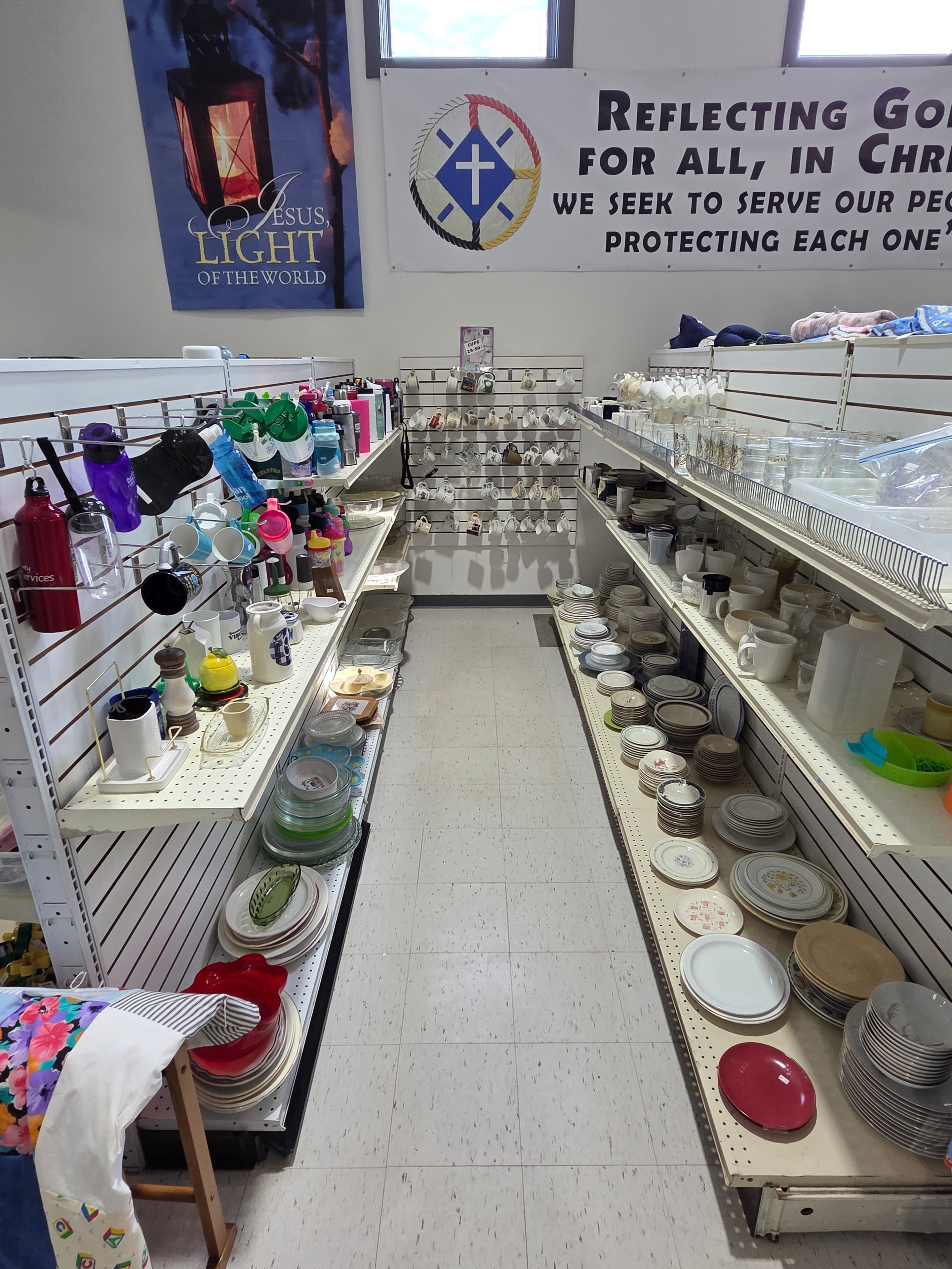 Main floor display of dishes, mugs, and kitchenware