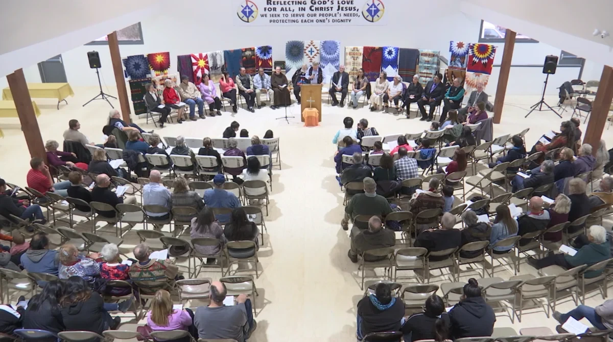 Community gathered in a circle for the dedication of the new Everything Beautiful store building on November 17, 2019